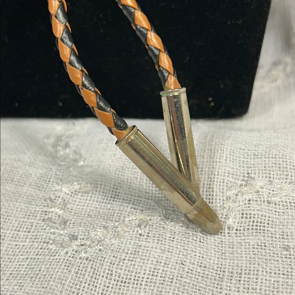 Vintage Bolo tie western leather and ornate medallion with bullet ends